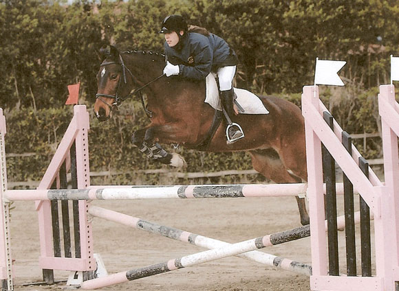 A rider in competition with Total Contact A rider in competition with Total Contact