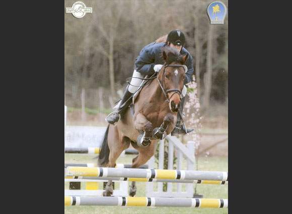 A rider in competition with Total Contact A rider in competition with Total Contact
